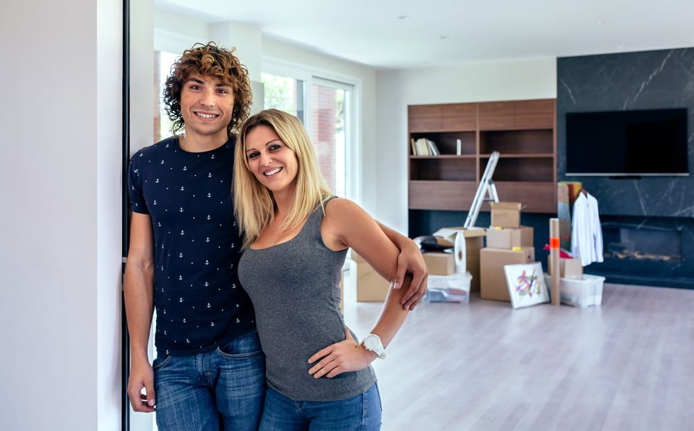 Couple posing in the living room