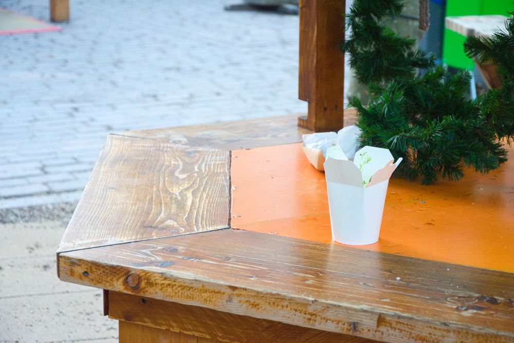 Disposable tableware on a wooden table