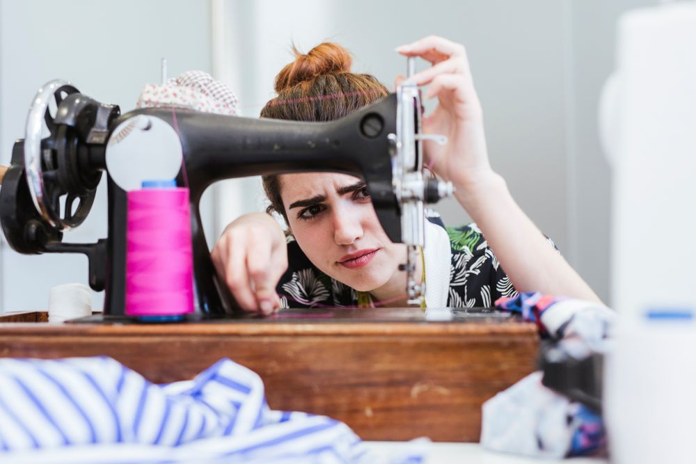 Woman in a sewing school