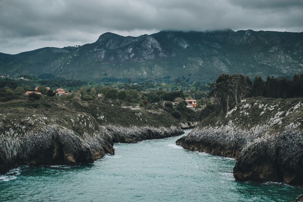Mountain valley on sea background