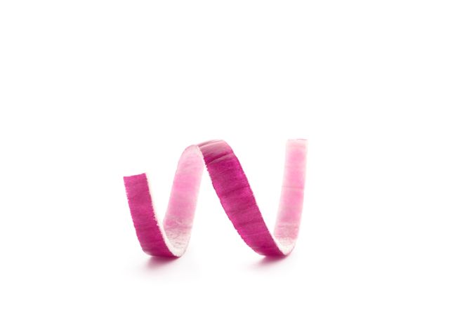 Red onion slice isolated on blank background