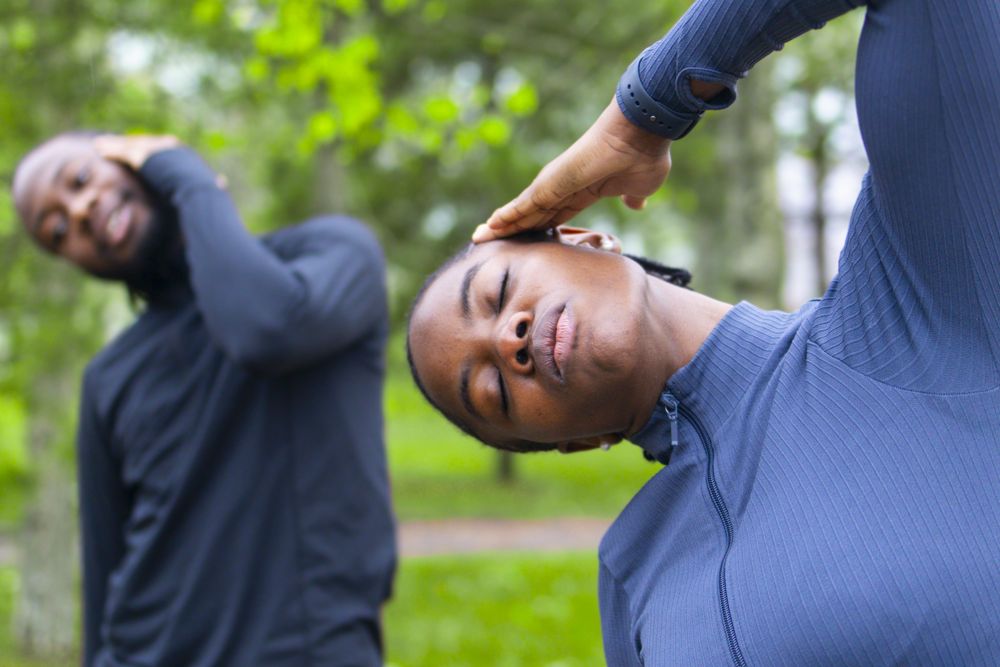 Black woman exercise mindfully.