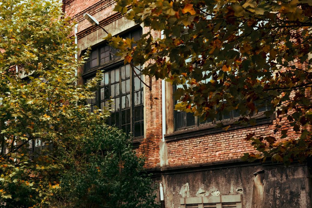 Facade of old building and cloudy sky