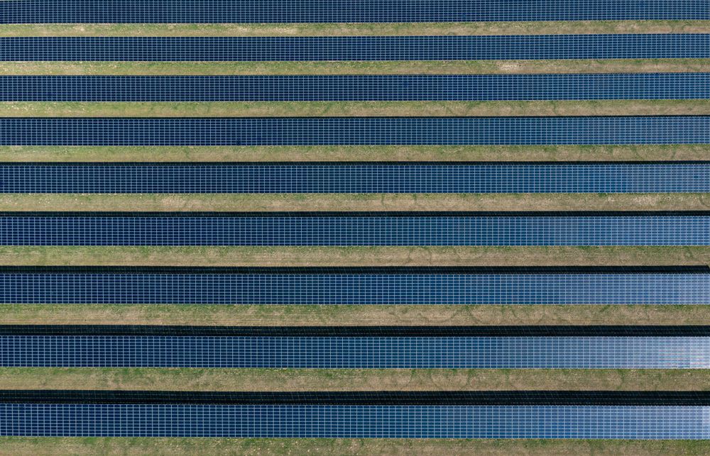 Photovoltaic panels farm in Germany, drone aerial view on a sunny day