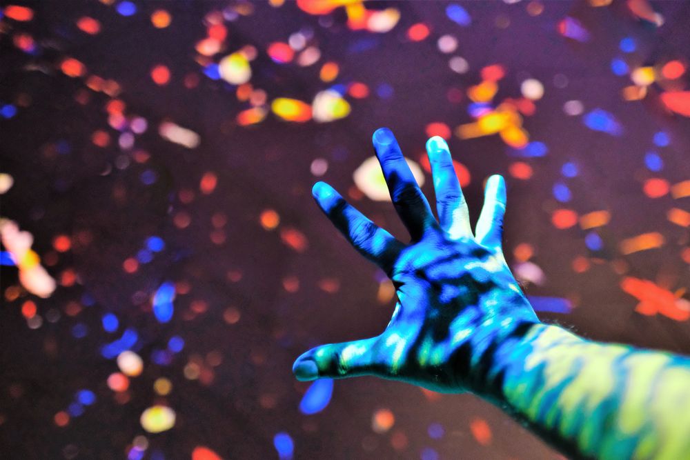 Hand with light projections