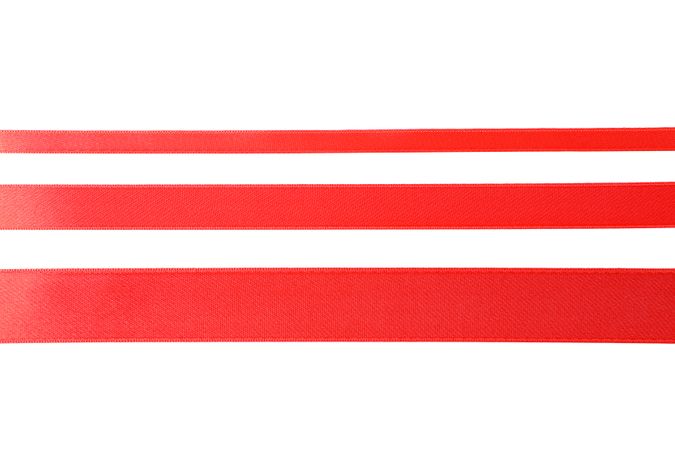 Red ribbons isolated on blank background. Gift concept