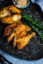 Close up of grilled chicken with rosemary