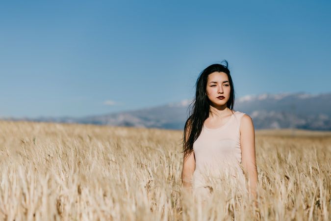 Woman standing in field