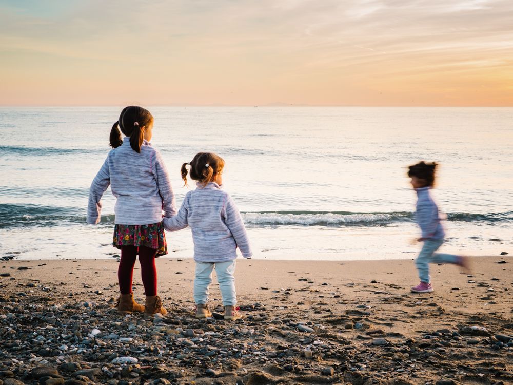 kids playing at the beach