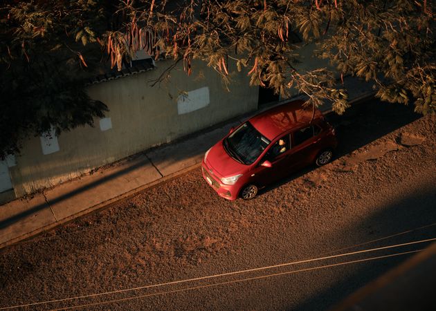 Looking down at car on street