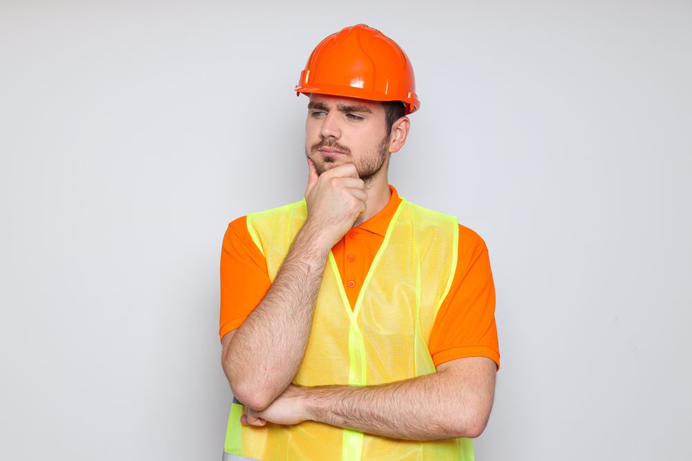 Young man civil engineer in safety hat