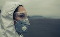Closeup of woman with protection suit
