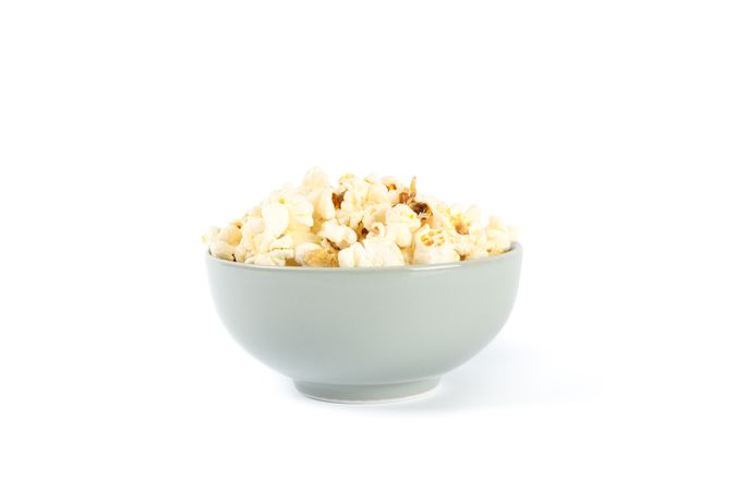 Bowl with popcorn isolated on blank background