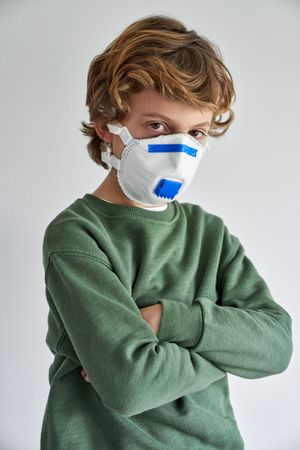 Boy in protective face mask