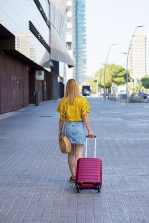 Young woman traveler going on holiday