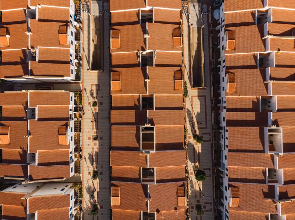Orange rooftops of modern town from above