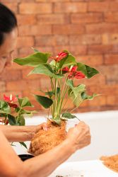 Older Woman Crafting Green gifts