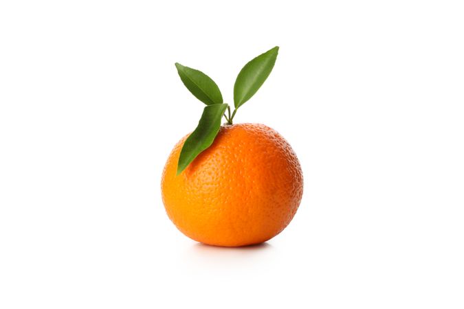 Ripe mandarin with leaves isolated on light background