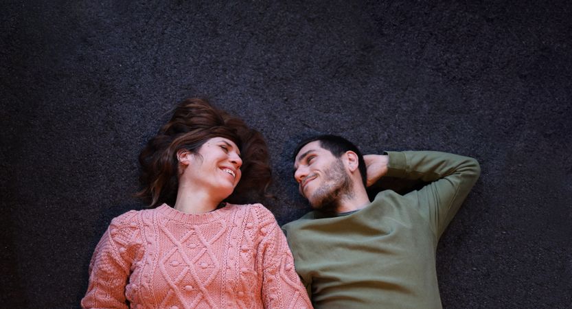 Smiling companions sharing a tender moment on Valentine's Day