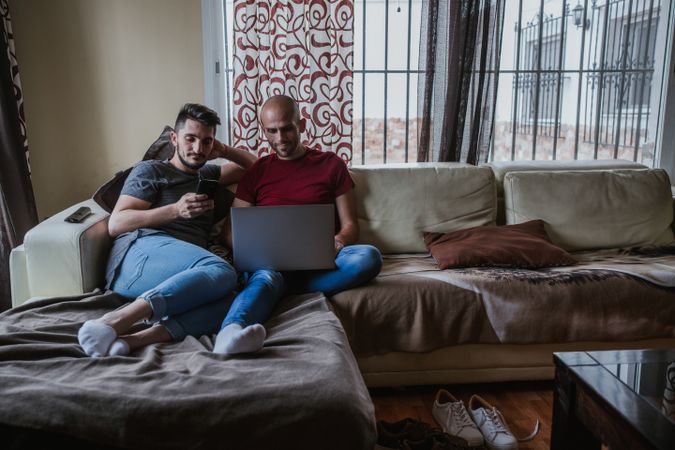Gay couple with computer