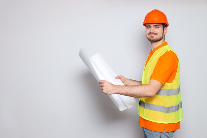 Young man civil engineer in safety hat