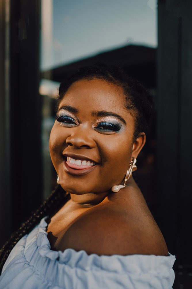 Content trendy Black woman on street