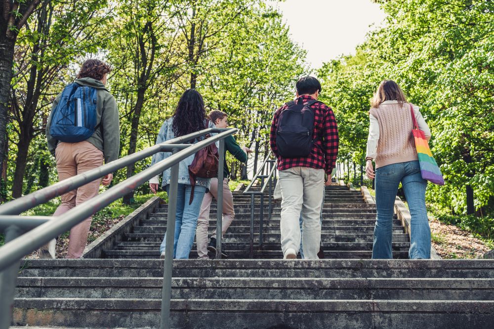 Back of students walking upstairs