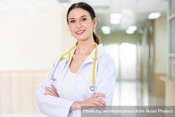 Portrait of proud female doctor with stethoscope smile in arms crossed 0Jwld5