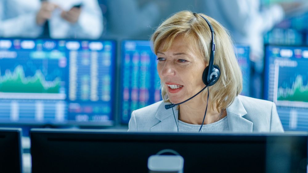 Chief Sales Force Representative Talks into the Headset.