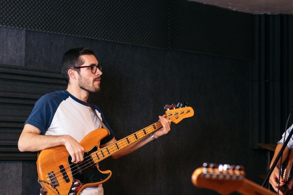 Close-up of a musician playing bass