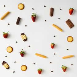 Coffee bean, cookie and strawberry pattern on light background