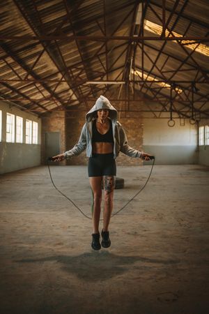 Fitness woman skipping rope