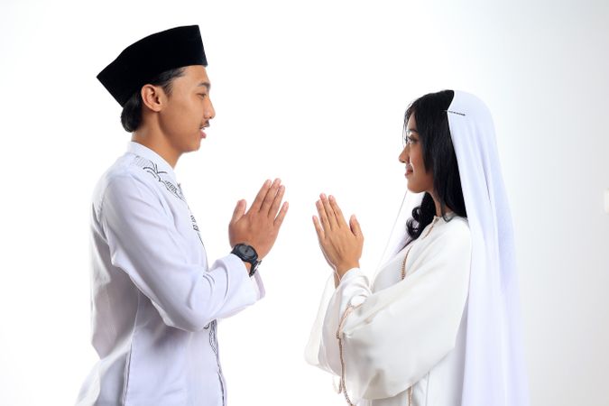 Muslim Asian Indonesian Couple Forgiving on Eid Mubarak