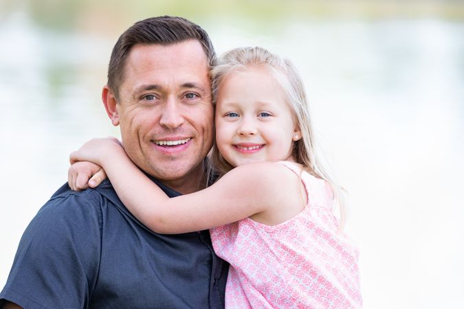 Portrait of Father and Daughter Outside