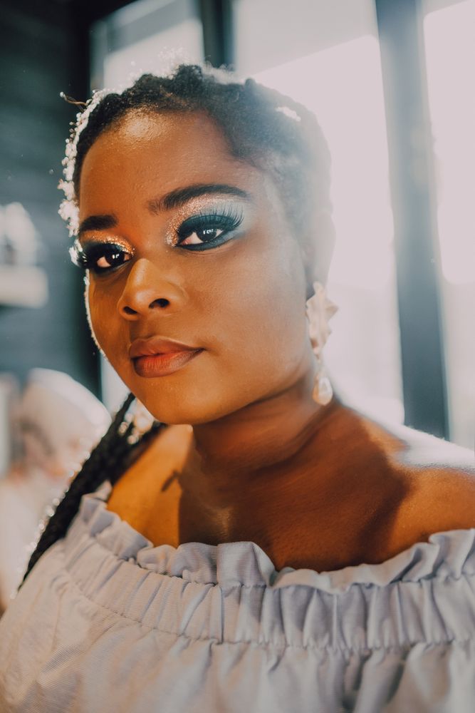 Headshot of confident trendy Black woman