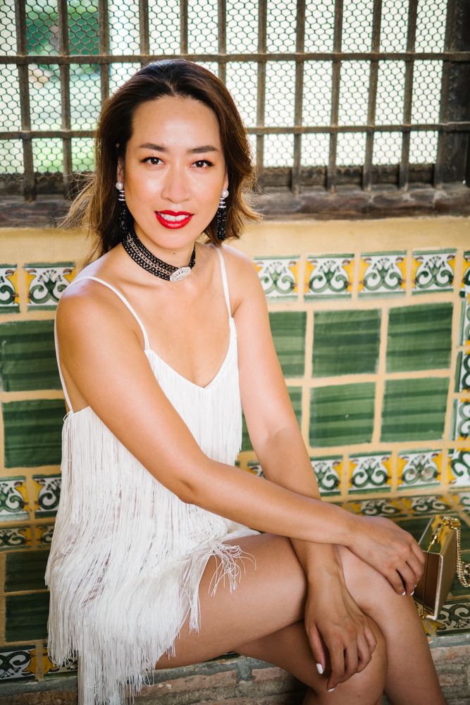 Young elegant Asian woman at a luxurious resort