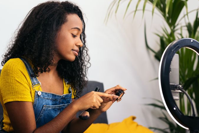 Beauty blogger making the most of technology.