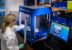 Scientist working at Caliper LifeSciences’ Zephyr Molecular Biology Workstation