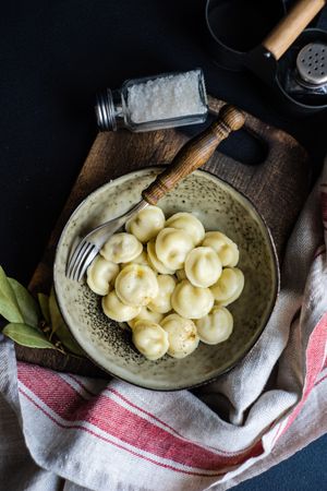 Top view of bowl of hearty Russian dumplings