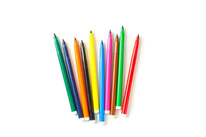 Color markers isolated on blank background, top view
