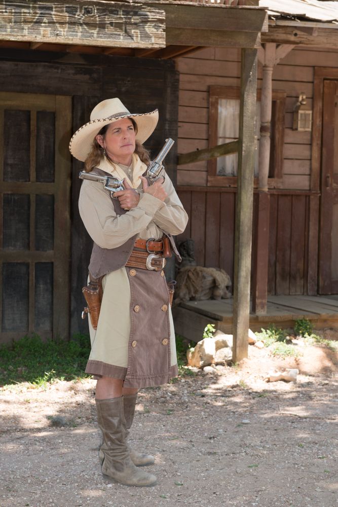 "Pistol Packin' Paula" Saletnik is the resident gun-twirler, Enchanted Springs Ranch, Boerne, Texas