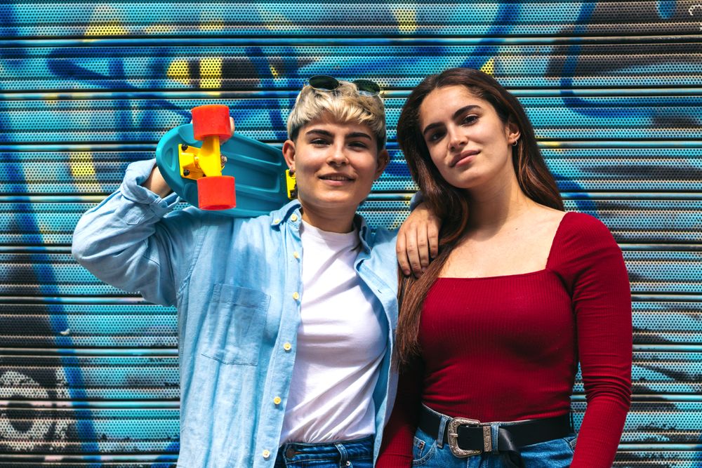 two women with a skate portrait