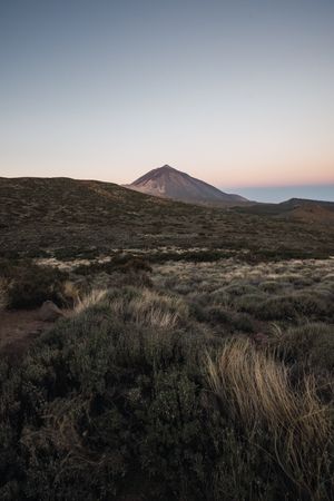 Mountain peak in desert valley