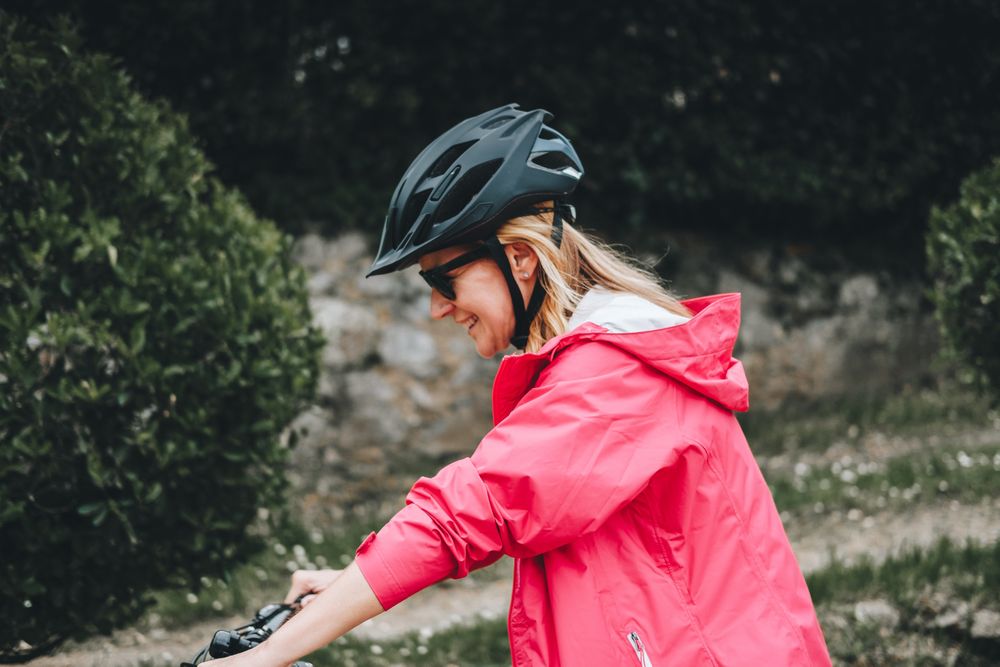 Smiling female riding bicycle