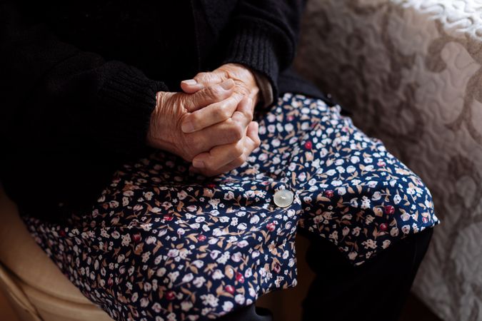 Detail of hands of an mature woman