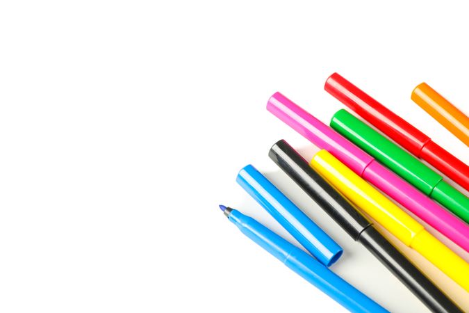 Color markers isolated on blank background, closeup