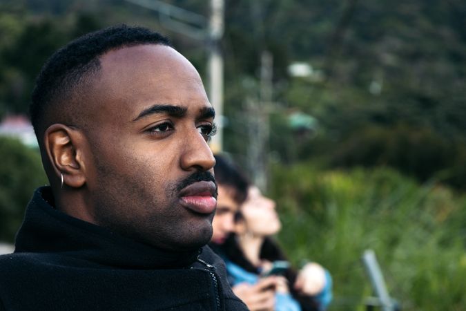 Serious Black man in nature
