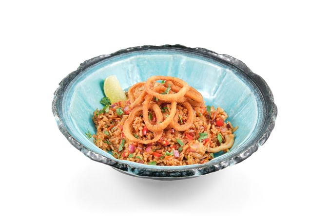Bowl of fried rice with calamari rings