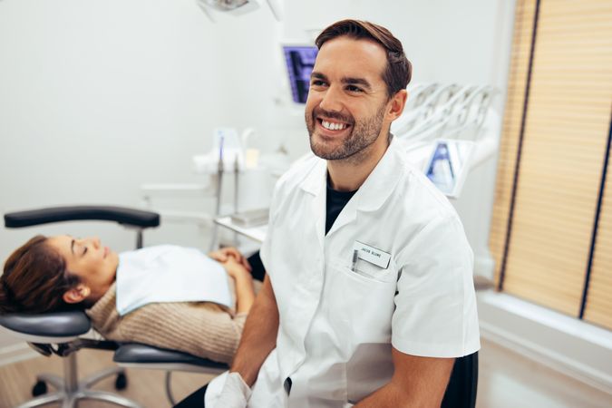 Male dentist in his dental office