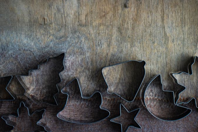 Cookie cutters on wooden table